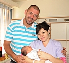 יליה ברנוב לאחר הלידה עם אבי התינוק